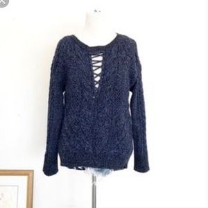 Blue sweater with cross cross detail